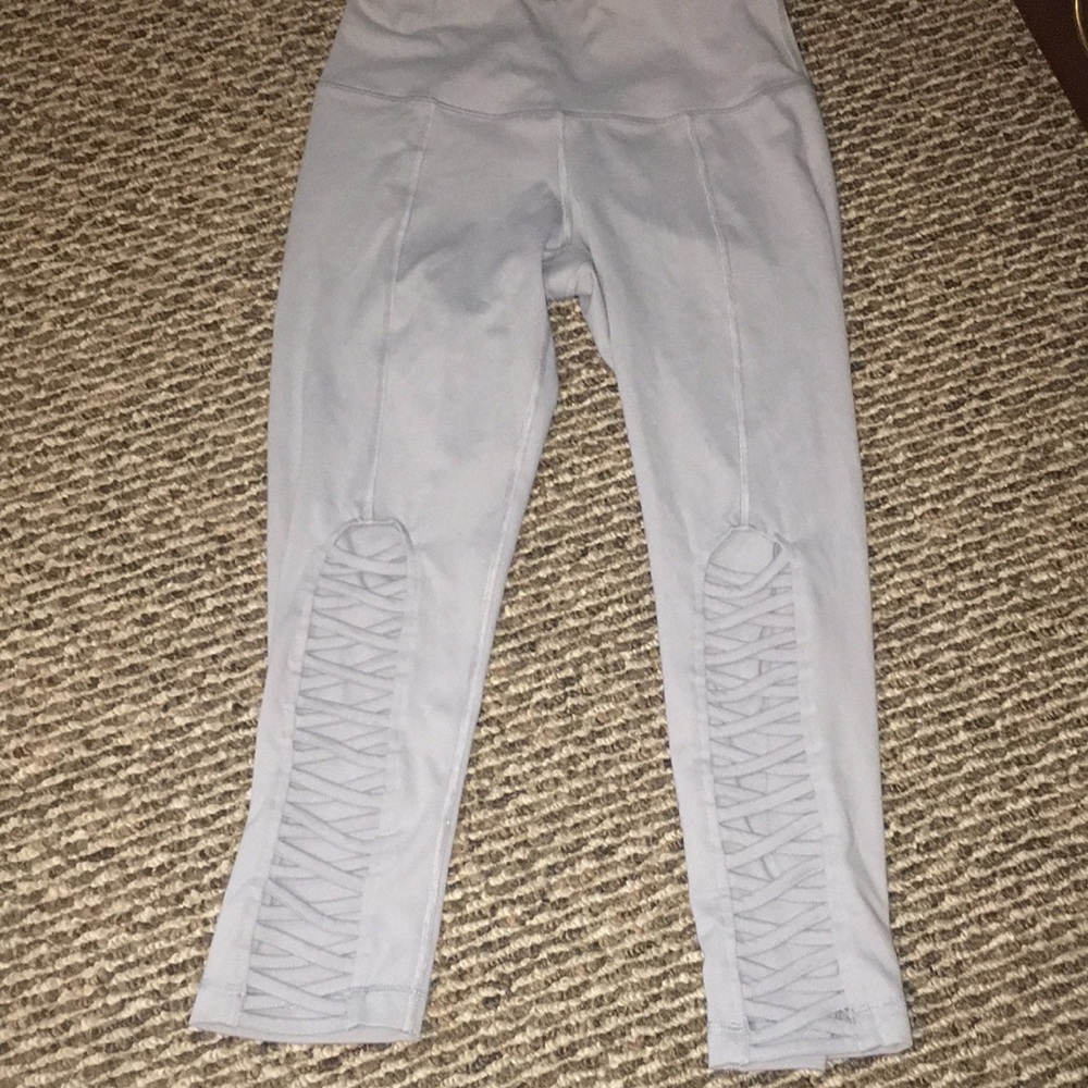 Light Greg/baby blueish yoga pants with design.